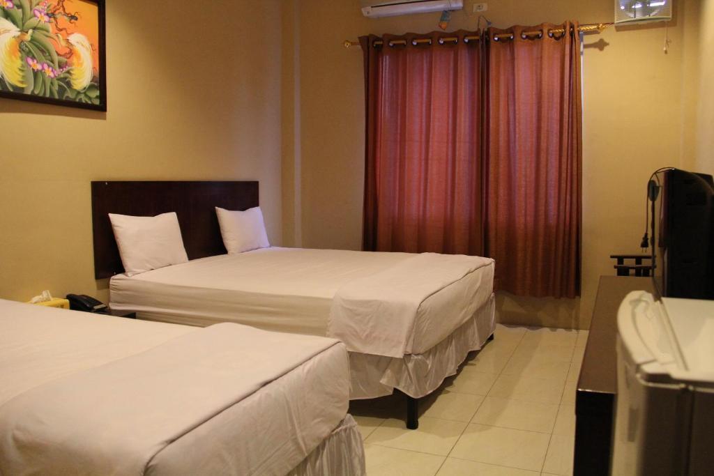 Hotel Sing A Song Pematangsiantar Δωμάτιο φωτογραφία
