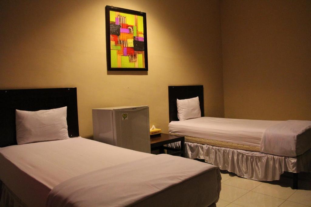 Hotel Sing A Song Pematangsiantar Δωμάτιο φωτογραφία