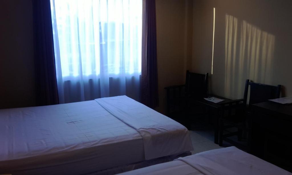Hotel Sing A Song Pematangsiantar Δωμάτιο φωτογραφία