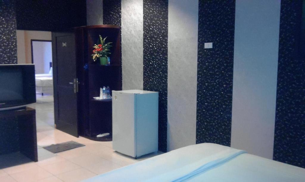 Hotel Sing A Song Pematangsiantar Δωμάτιο φωτογραφία